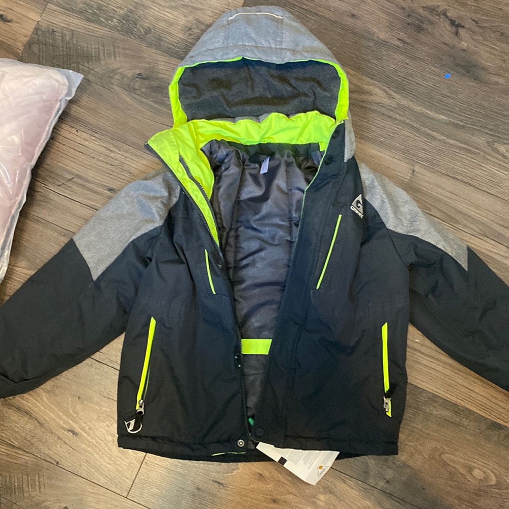 Gerry coat size 7/8 great condition tons of zippers
